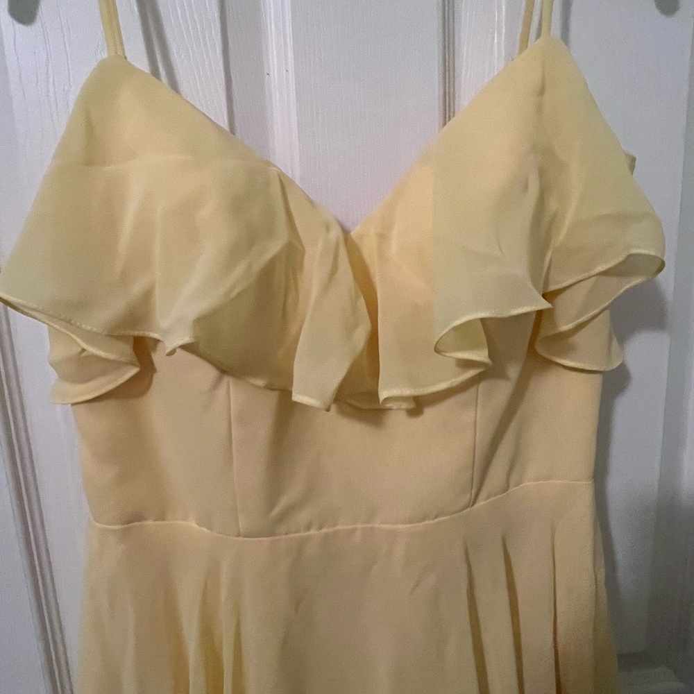 Size 4 pastel yellow bridesmaid dress. Worn only once.